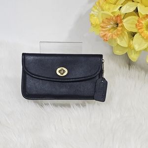 black leather turnlock wallet